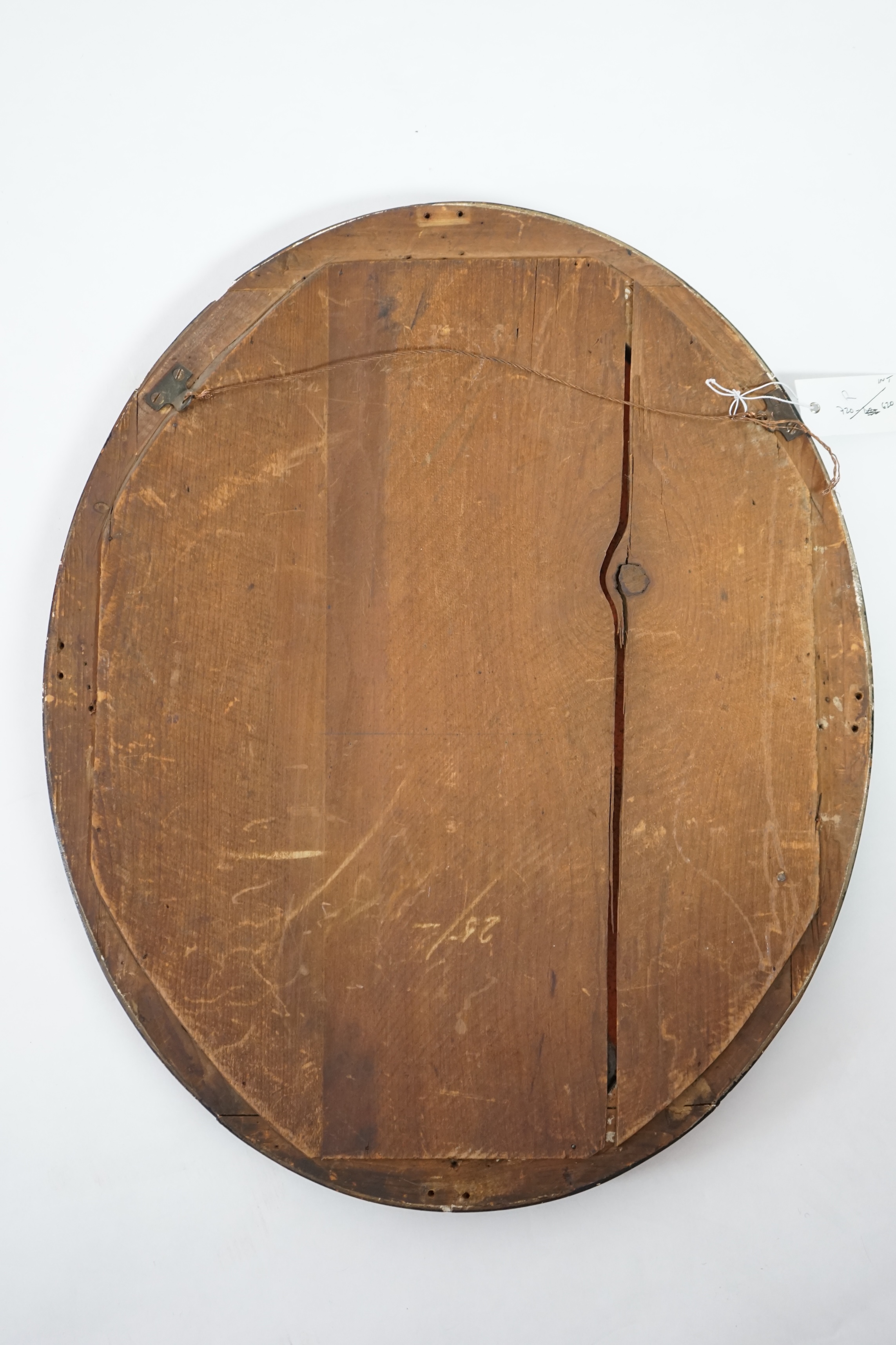 A 19th century Irish ebonised and silvered frame oval wall mirror